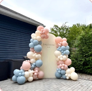 Pastel pink and blue outdoor celebration backdrop