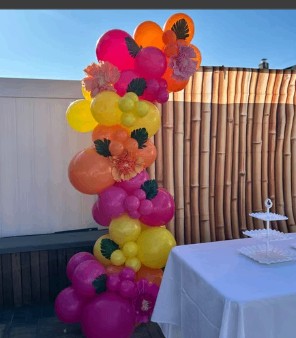Tropical pink, orange and yellow balloon arch